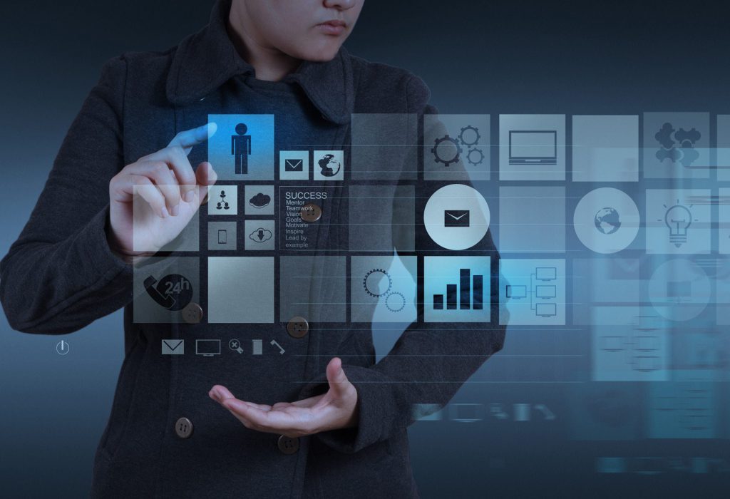 Website designer working with the new computer interface as design concept